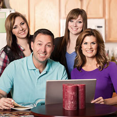 smiling family at a table